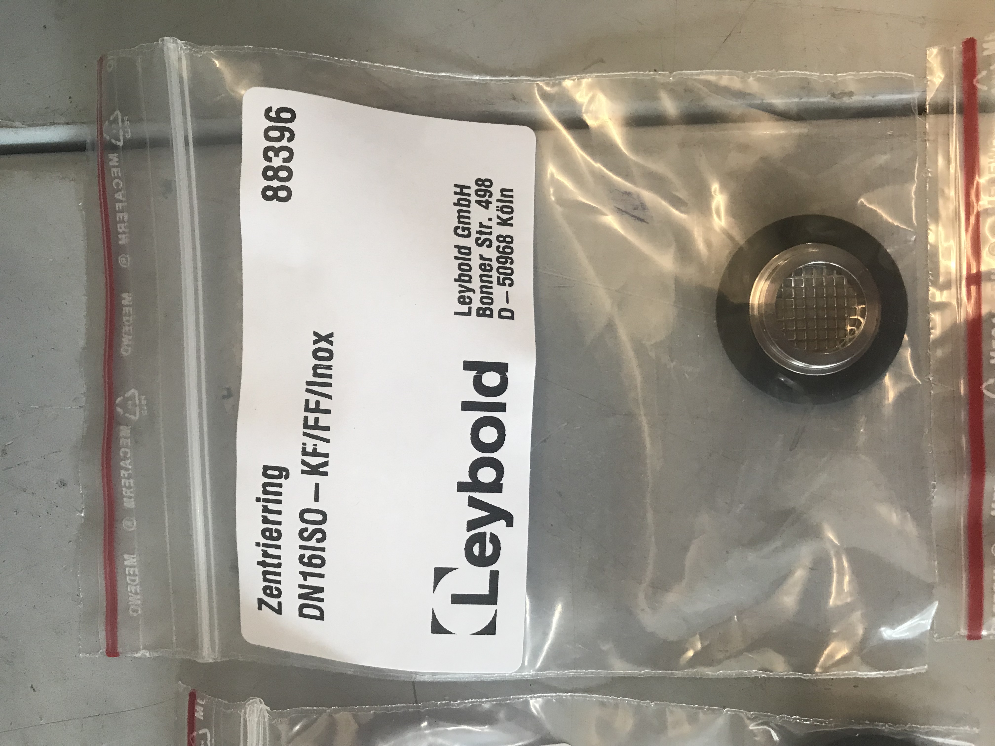 leybold-dn16-iso-kf-88396-filter-type-gasket-a74fd4ed-17f1-4571-9a3b-fcd79e74de8b.JPG